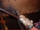 Preparing to rivet the mudring
